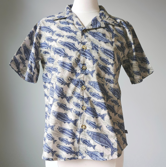 Salmon Run Camp Shirt

 	Short sleeve, button up camp style shirt
 	Loose, relaxed fit
 	All over print
 	Single chest pocket
 	Curved hem
 	100% cotton
 	2 extra buttons included

See below for size chart