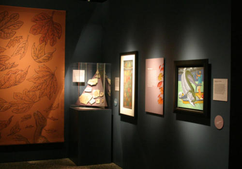 Original artworks, text panels, and a projection painting on canvas