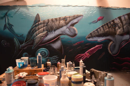 Helicoprion mural in progress with Memo Jauregui