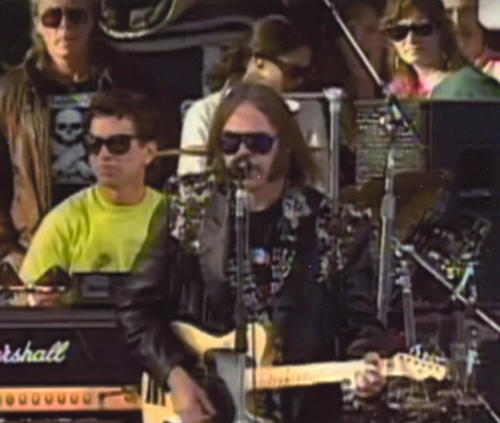 Gary Duncan from Quicksilver Messenger Service with Neil Young in the foreground 