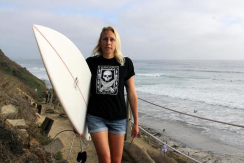 Oriana Poindexter rockin' a STYD shirt on a SoCal beach